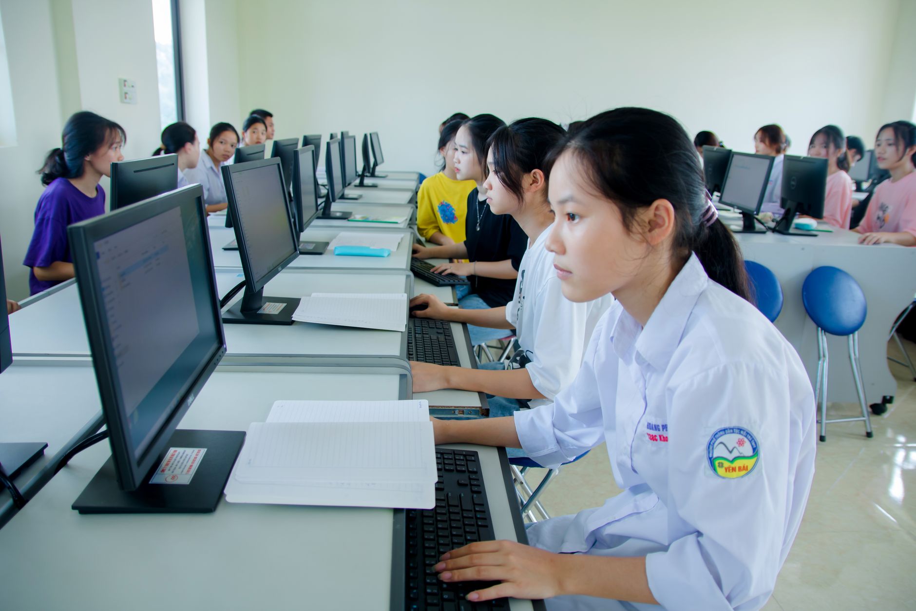 Students studying in a computer classroom