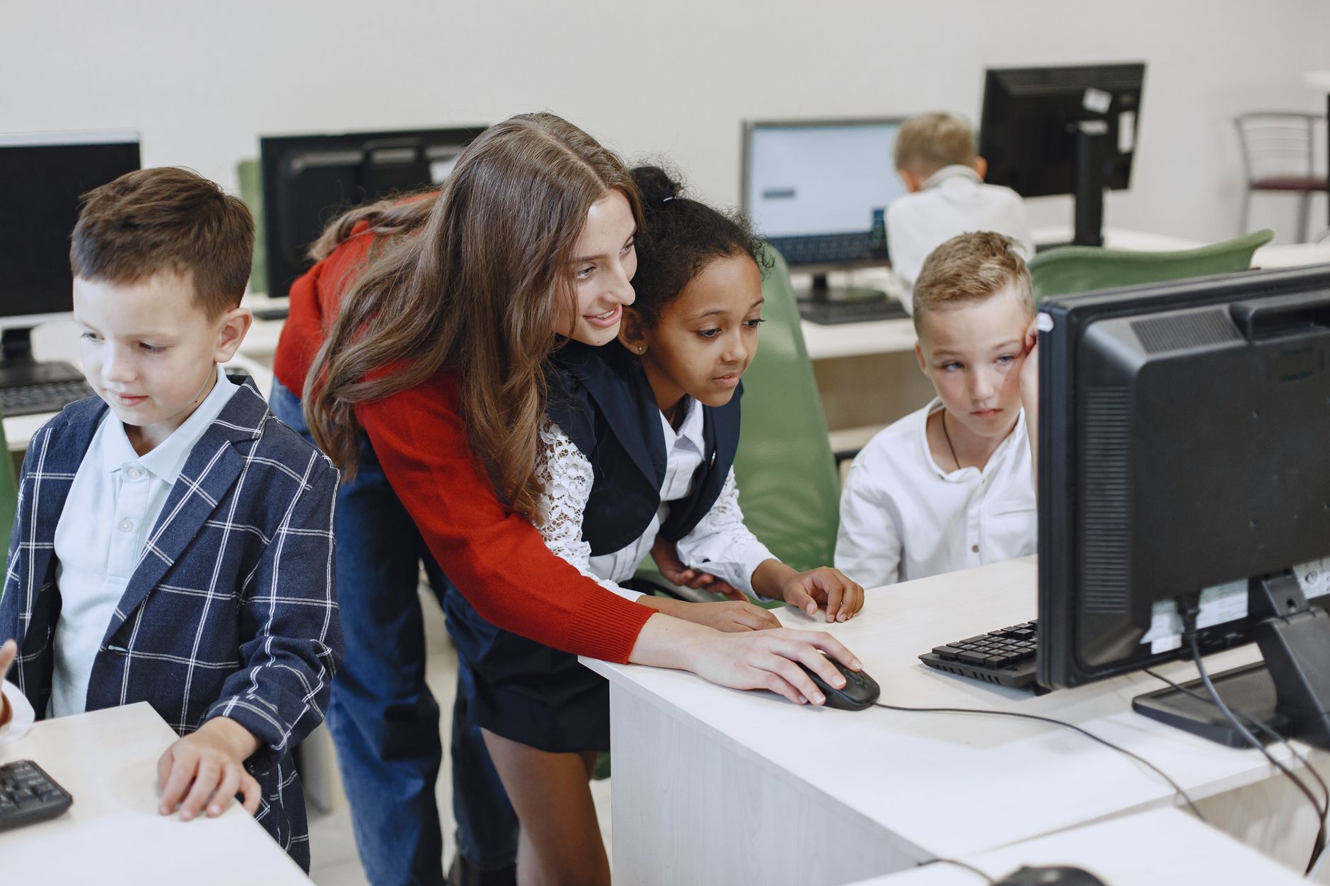 Students learning cybersecurity in a technology classroom
